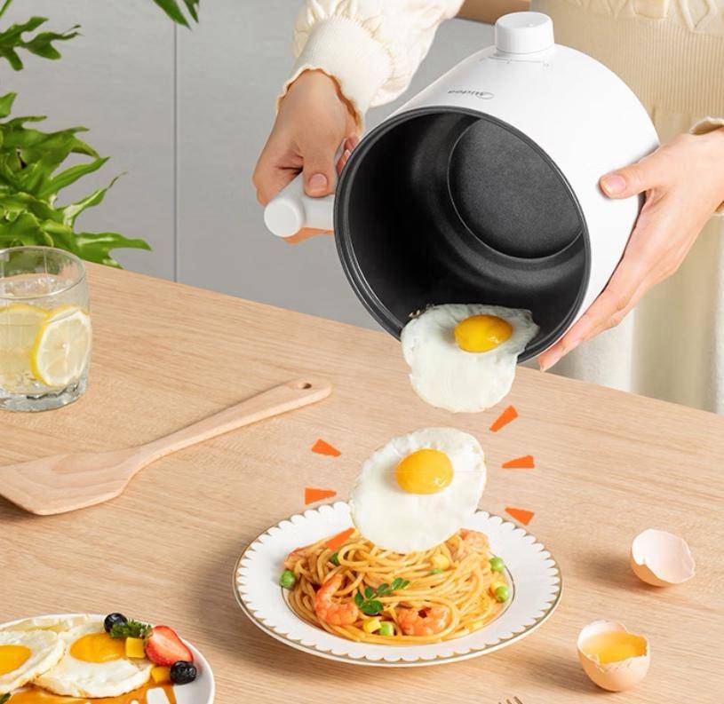 小宇宙一锅承包你的味蕾盛宴！凯发app网站美的电煮锅美食(图2)